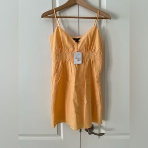 Light orange spaghetti strap summer dress. Size Smal